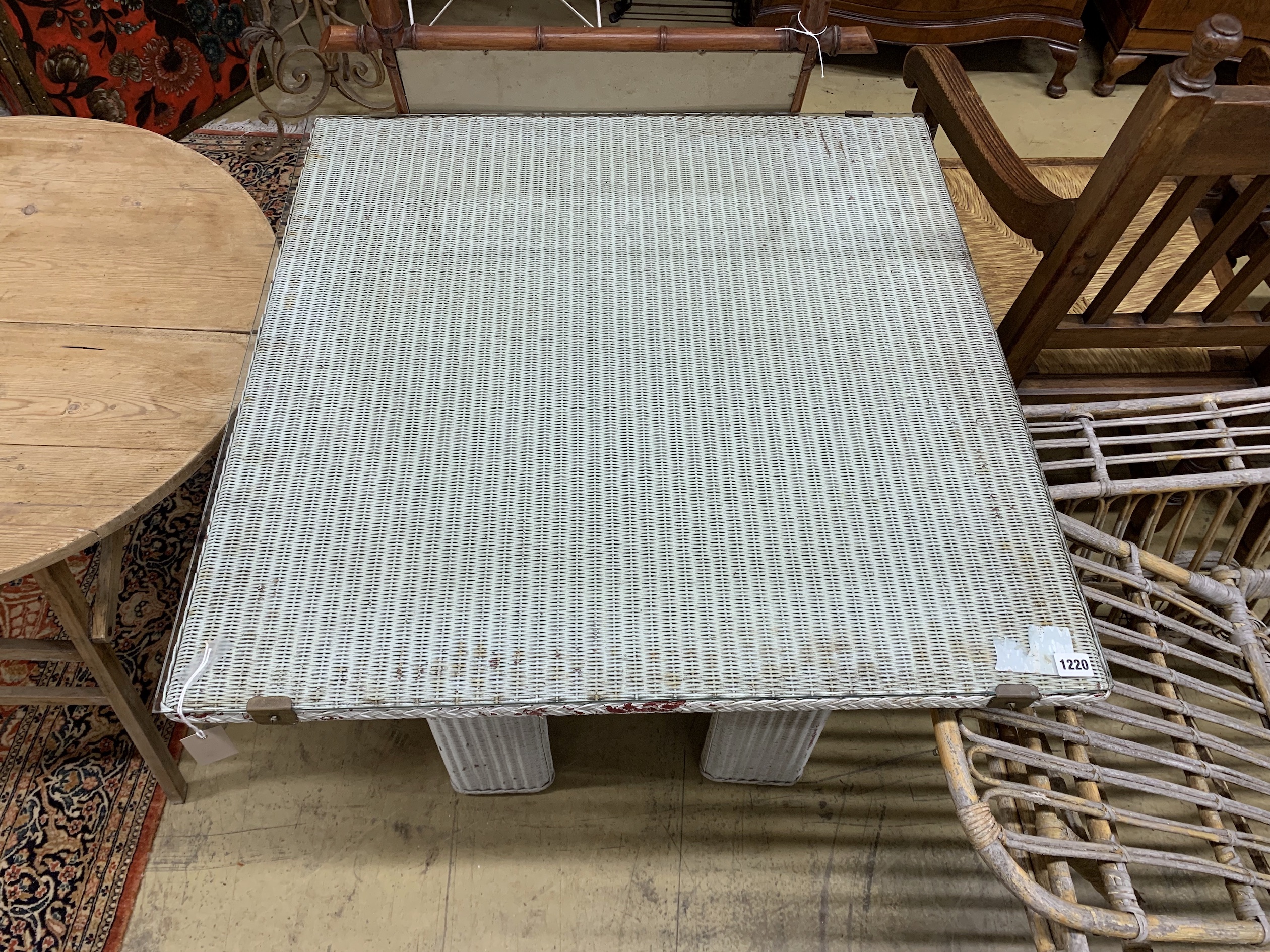 A vintage Lloyd Loom square table, width 84cm, height 72cm